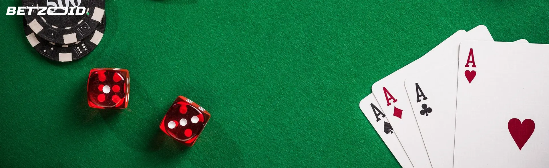 Cards, dice and casino chips on a green background.