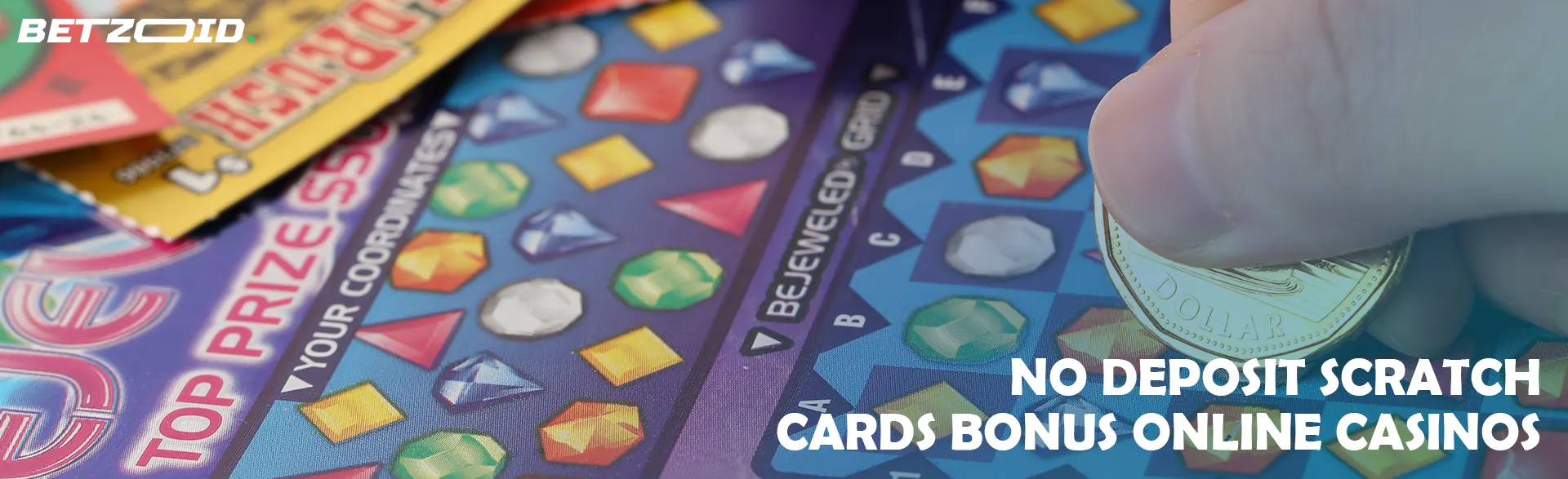 A person erases a scratch card with a coin.