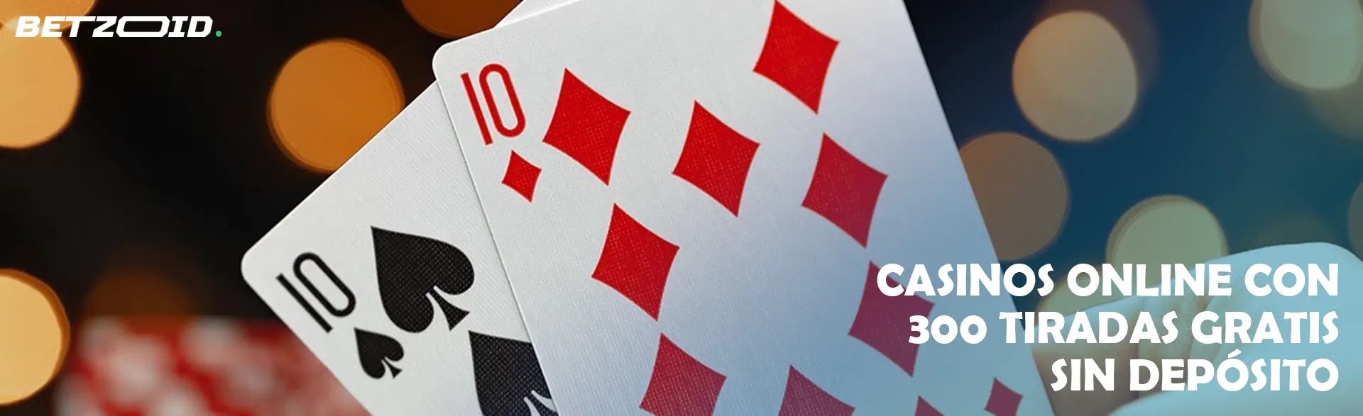 Dos cartas contra el fondo de las luces del casino.