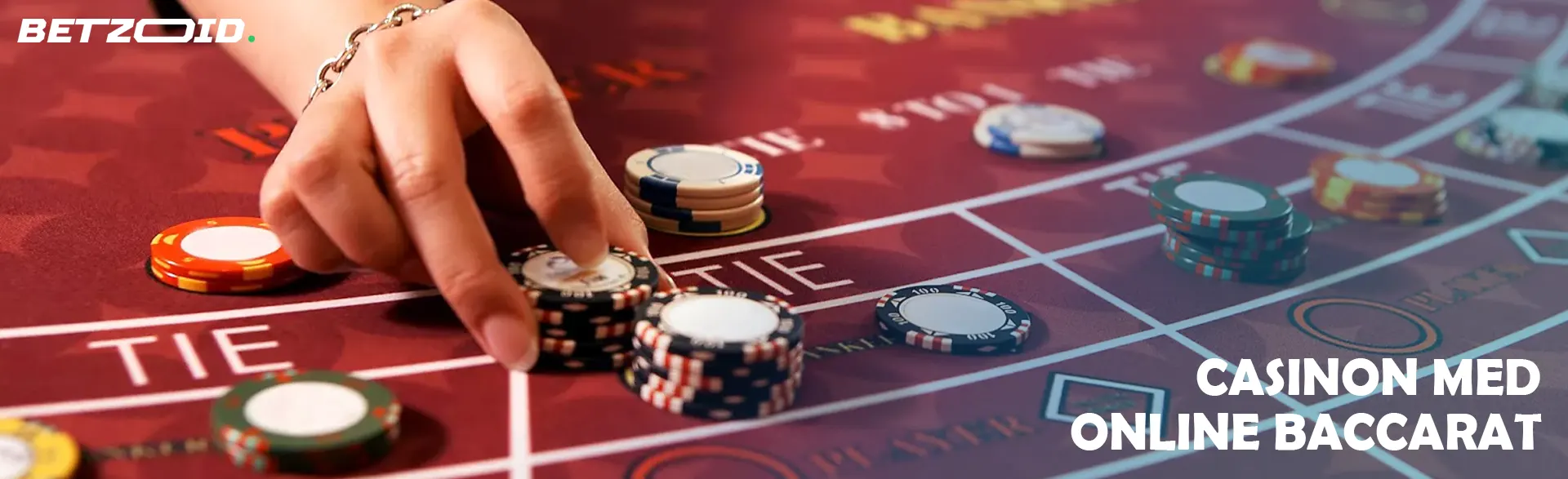 En spelare placerar marker på kasinobordet.