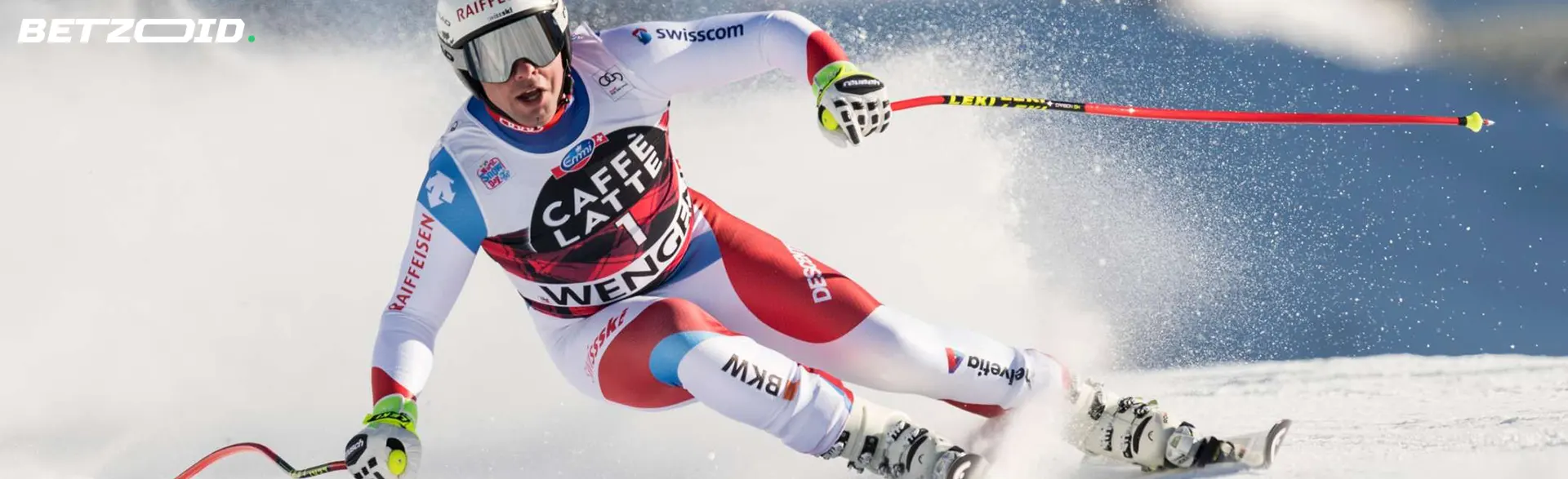 En skiløper går ned en bakke.