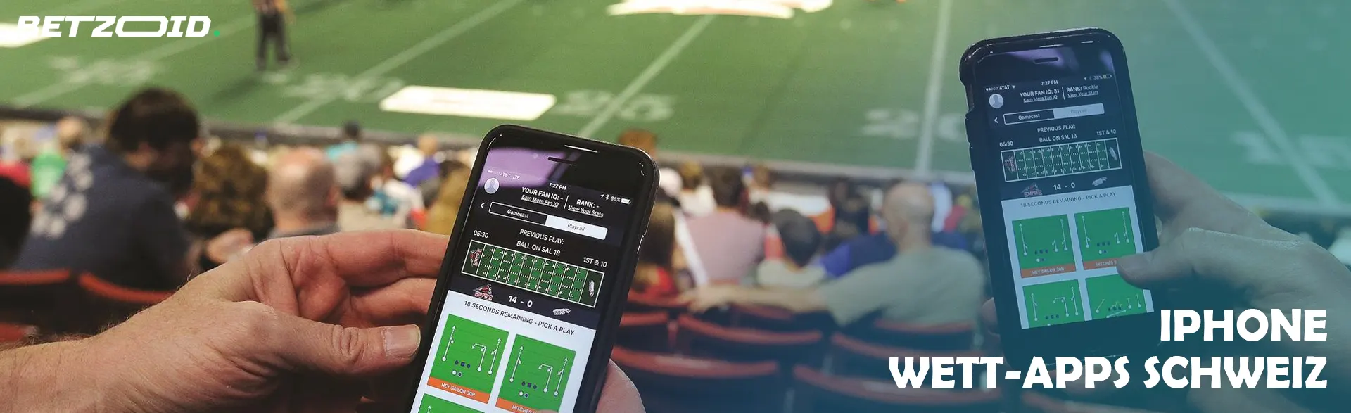 Zwei Personen nutzen Wett-App im Stadion.