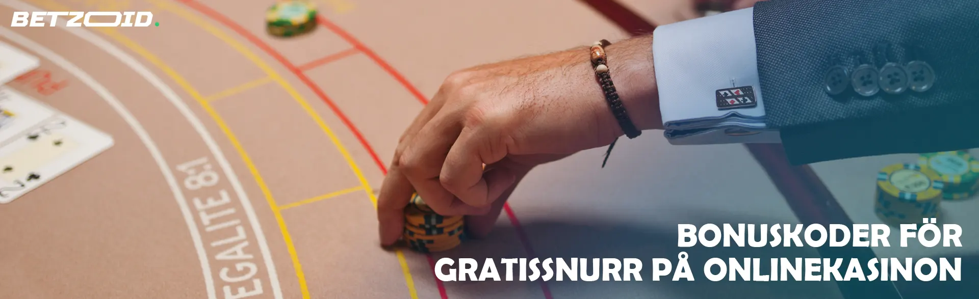 En spelare placerar marker på kasinobordet.