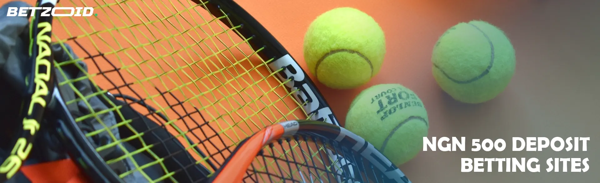 Tennis balls near the rackets.