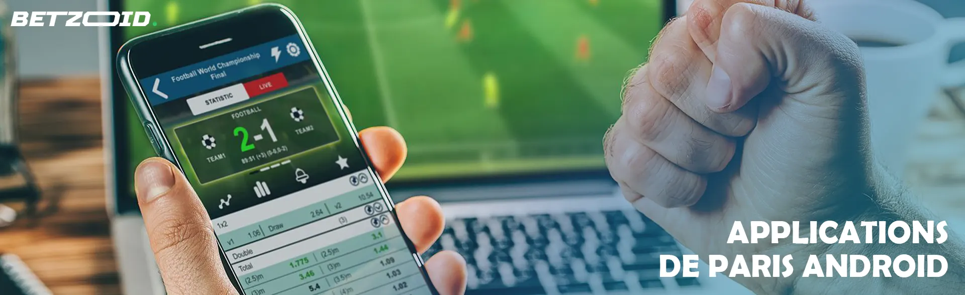 Un smartphone avec des paris dans la main d’une personne.