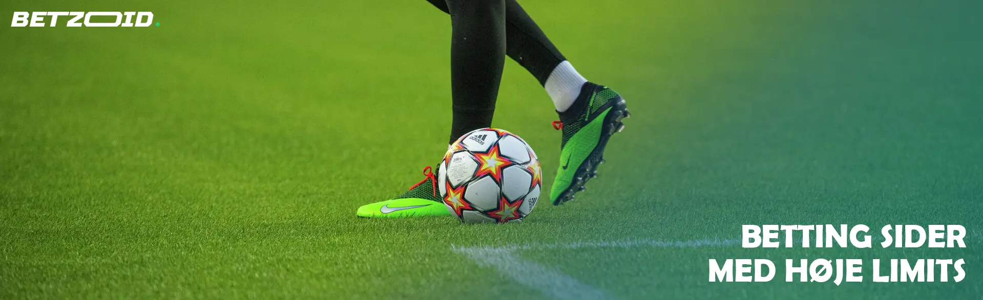 Bolden ved fodboldspillerens fødder.