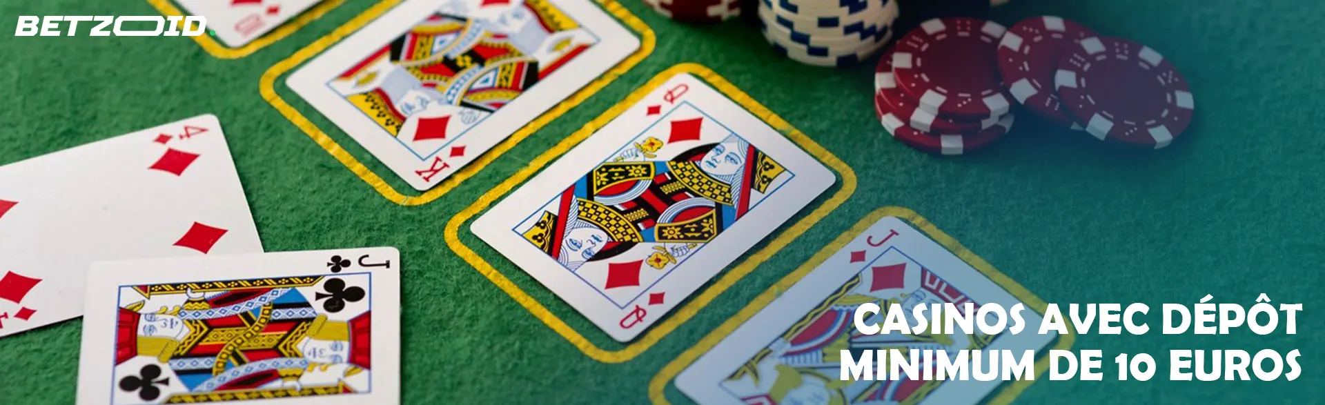 Des cartes et des jetons sur une table verte.