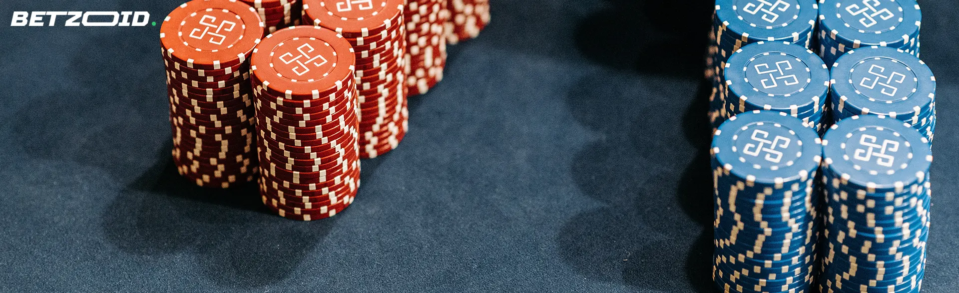 Stacks of chips on a casino table.