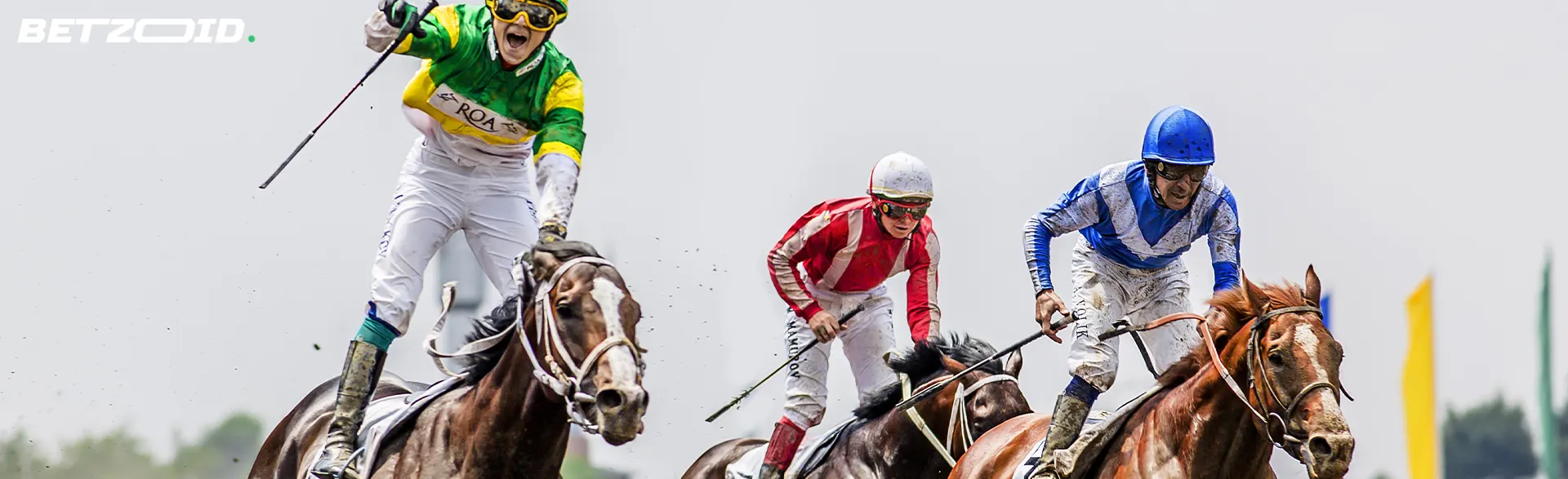 Jockeys on horses during a race.