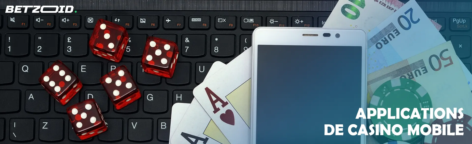 Cartes, jetons, dés et smartphone sur un clavier.