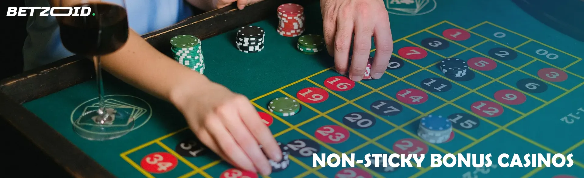 Players place bets with casino chips.