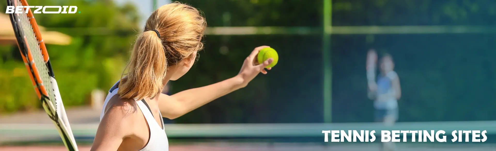 Tennis players are playing on the court.