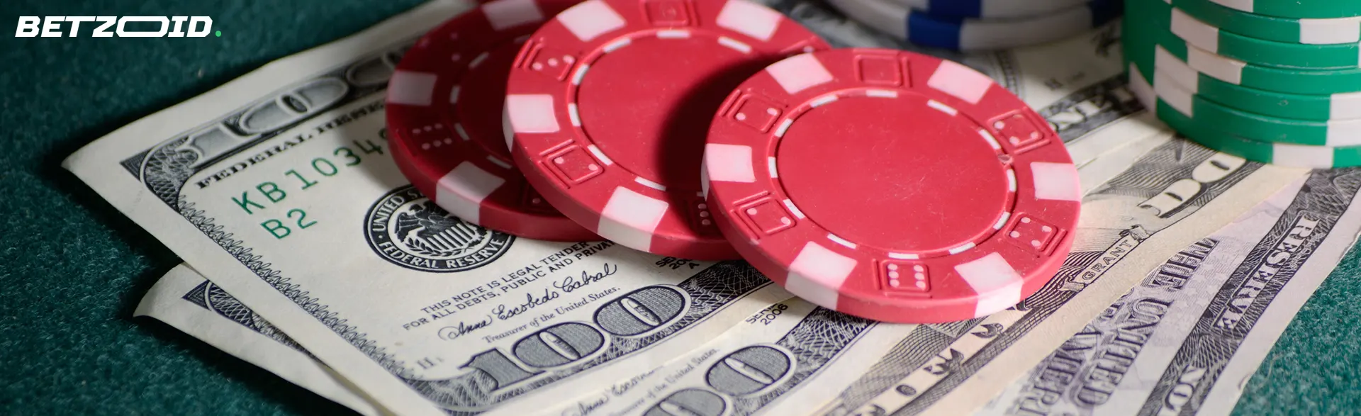 Poker chips lie on banknotes.