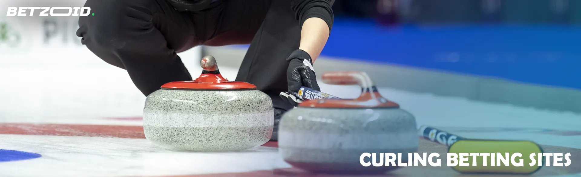 A curler pushes a stone on the ice.