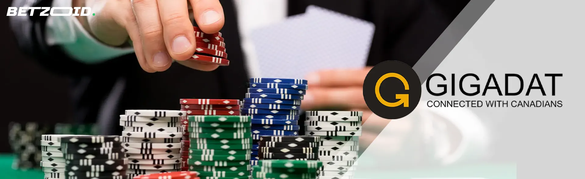 The player places the chips in a stack in front of him next to the Gigadat logo.