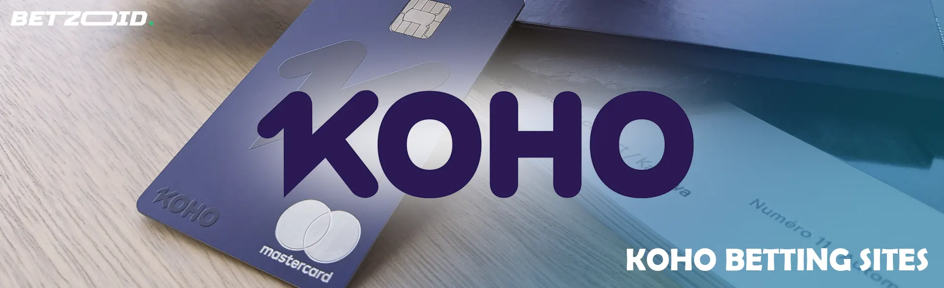 Koho logo on the background of a Koho bank card.