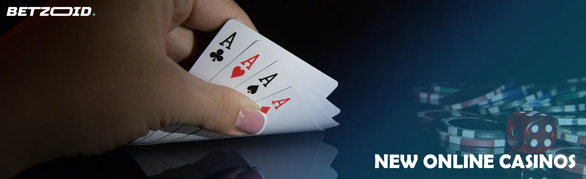 The player holds cards next to casino chips and dice.