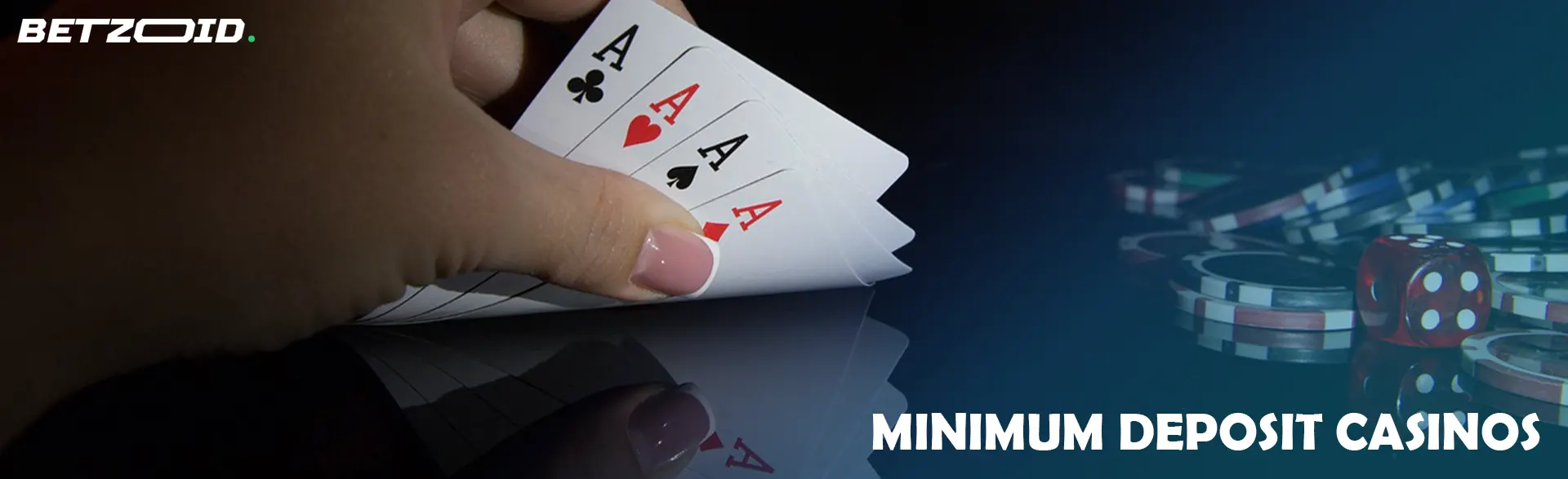 The player holds cards next to casino chips and dice.