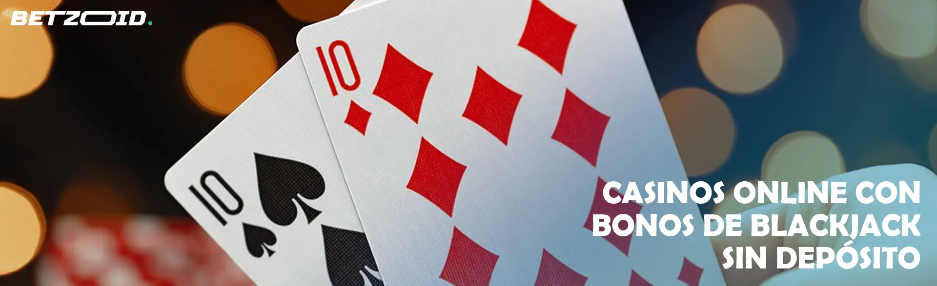 Dos cartas sobre el fondo de las luces del casino.