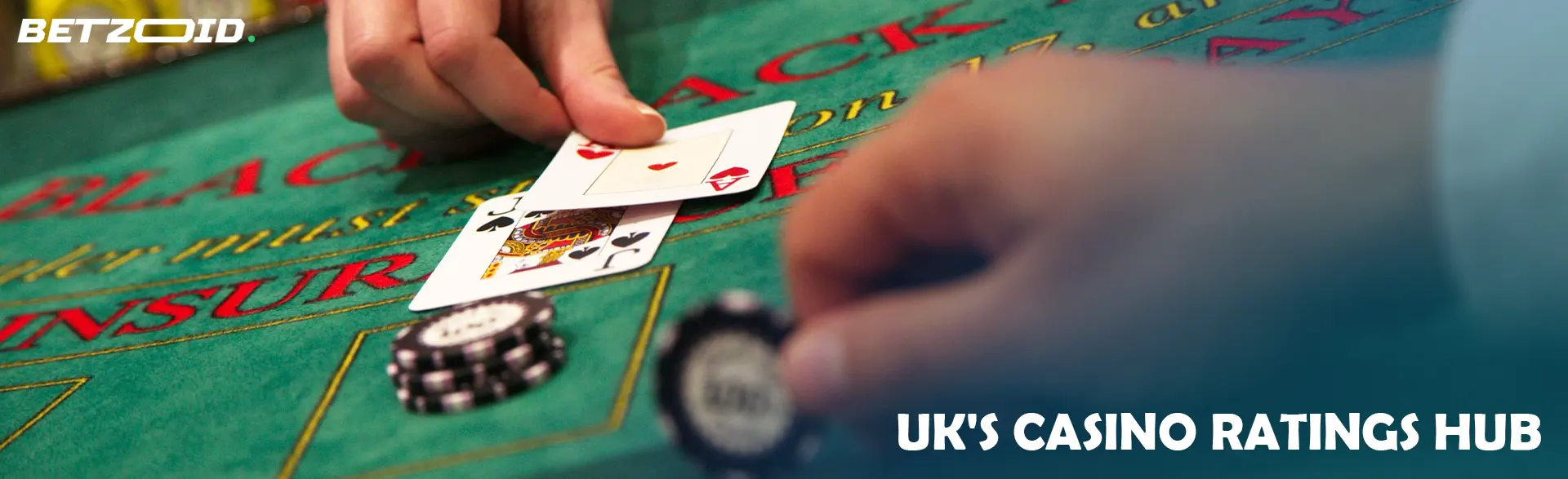 The player places cards on the casino table.