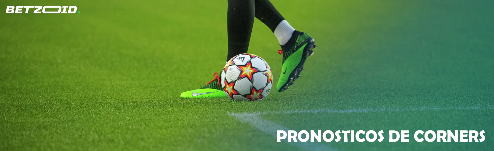 Un balón de fútbol a los pies de un jugador de fútbol.