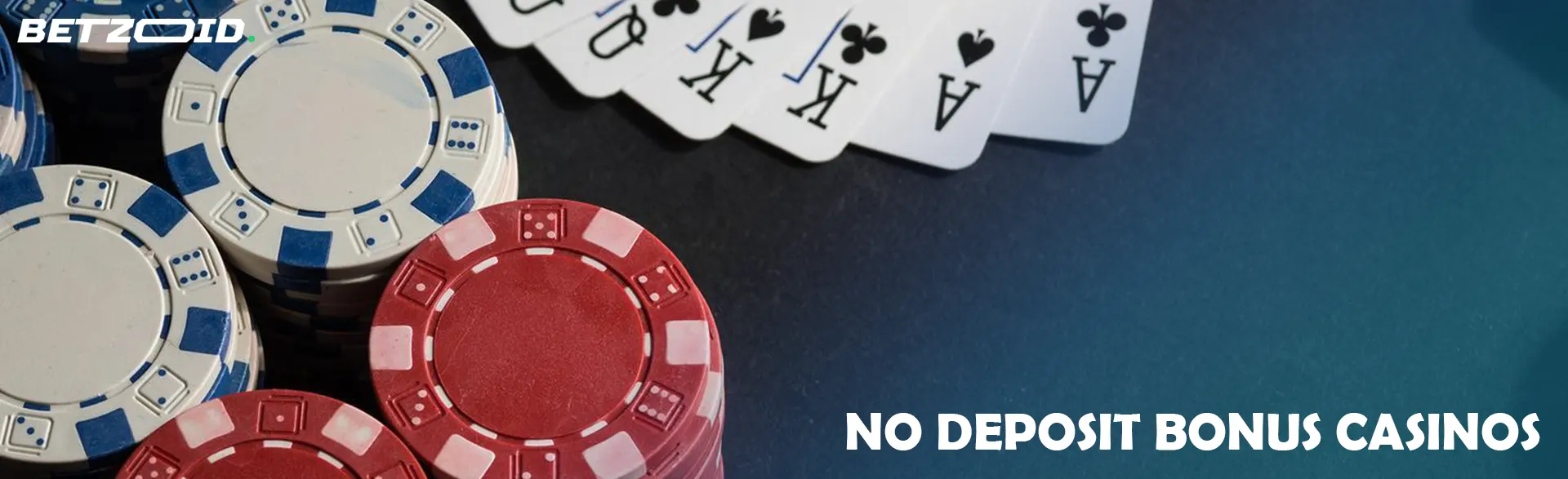 Cards next to chips on a gray background.