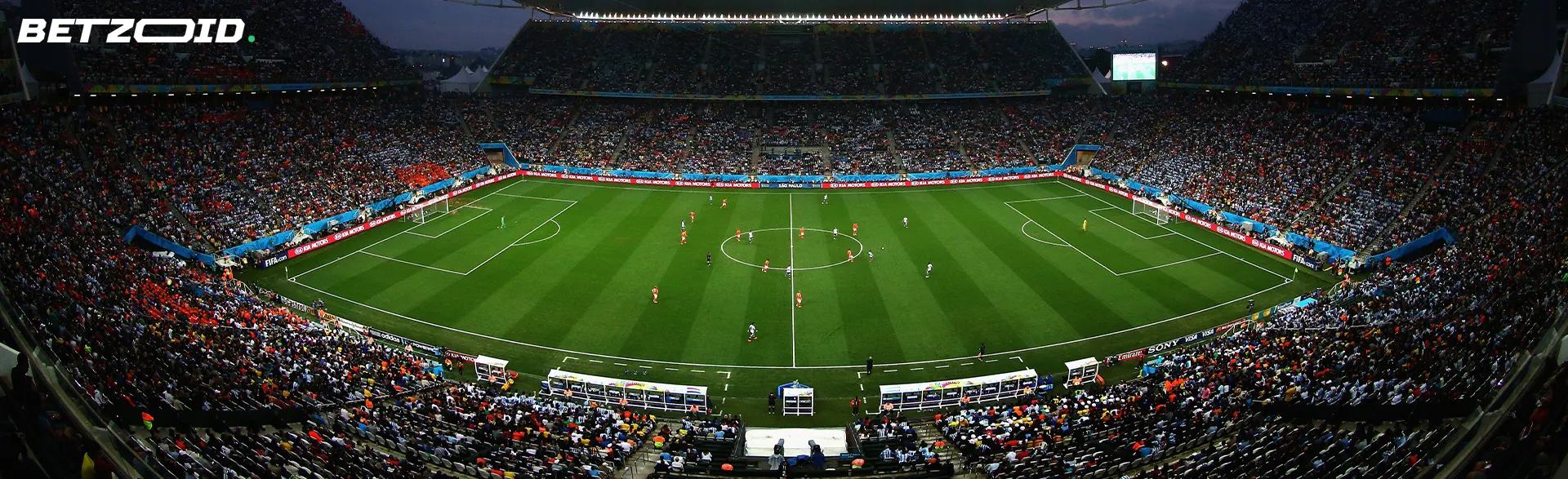 Estadio de fútbol durante un partido.