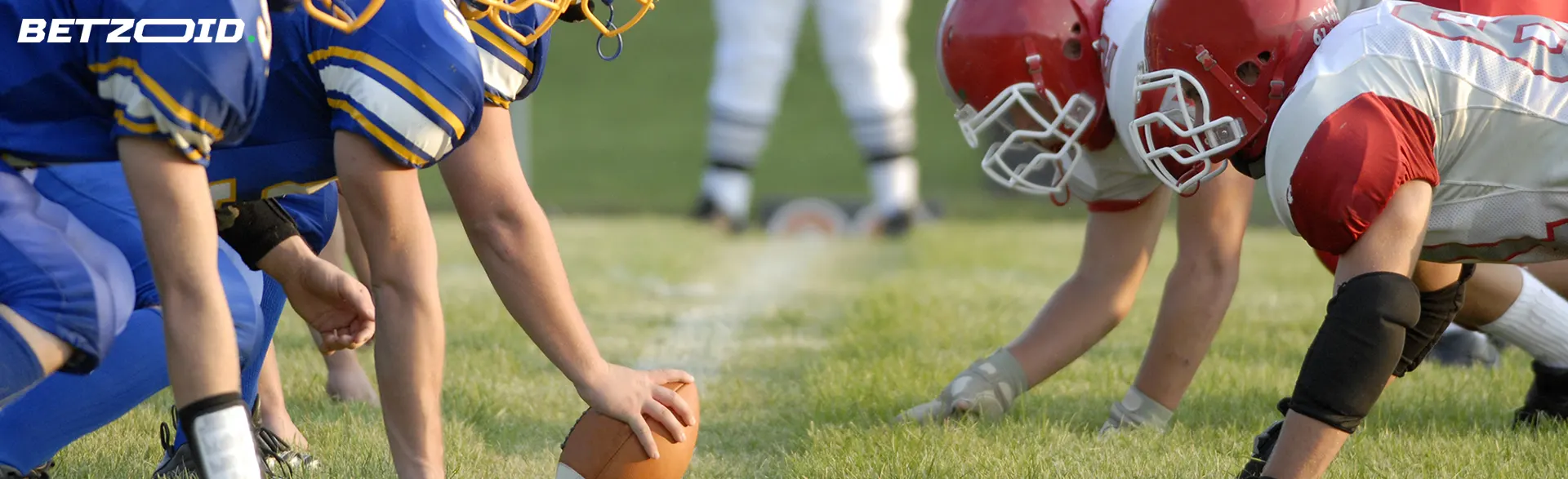American football players with the ball before the match.