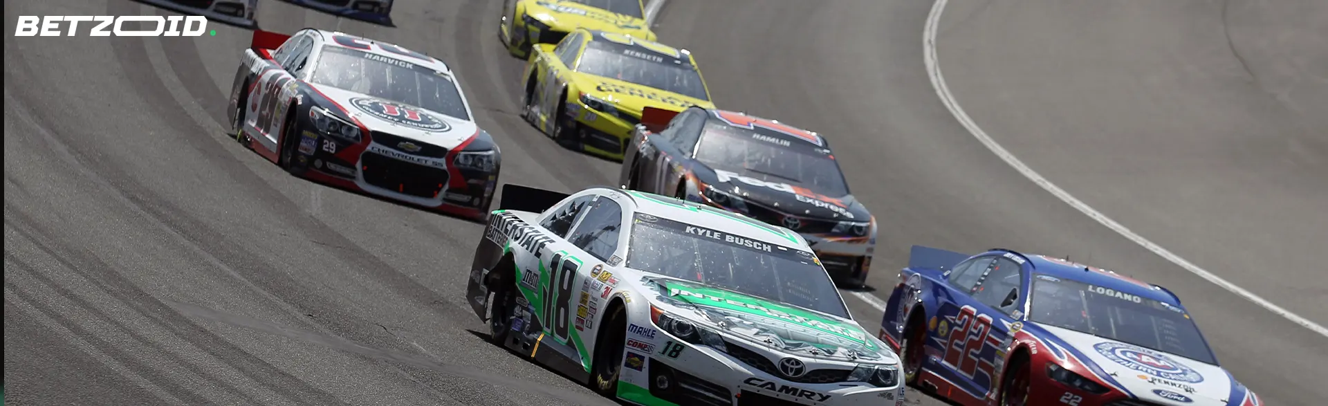 NASCAR race cars during a race.