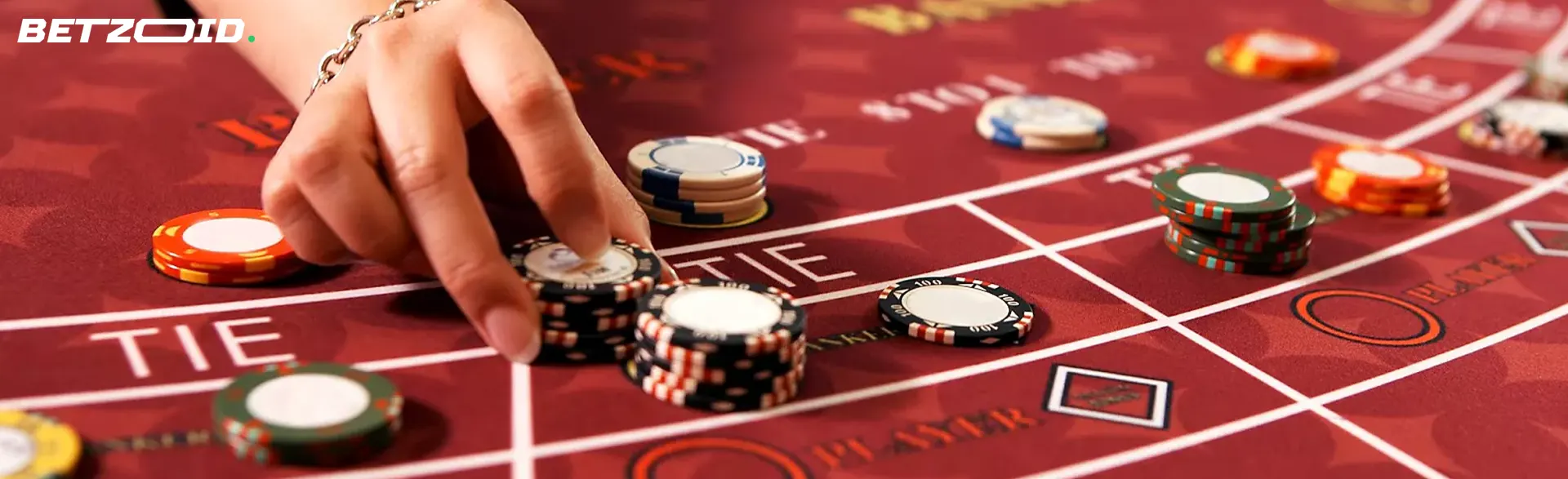 The player places chips on the casino table.