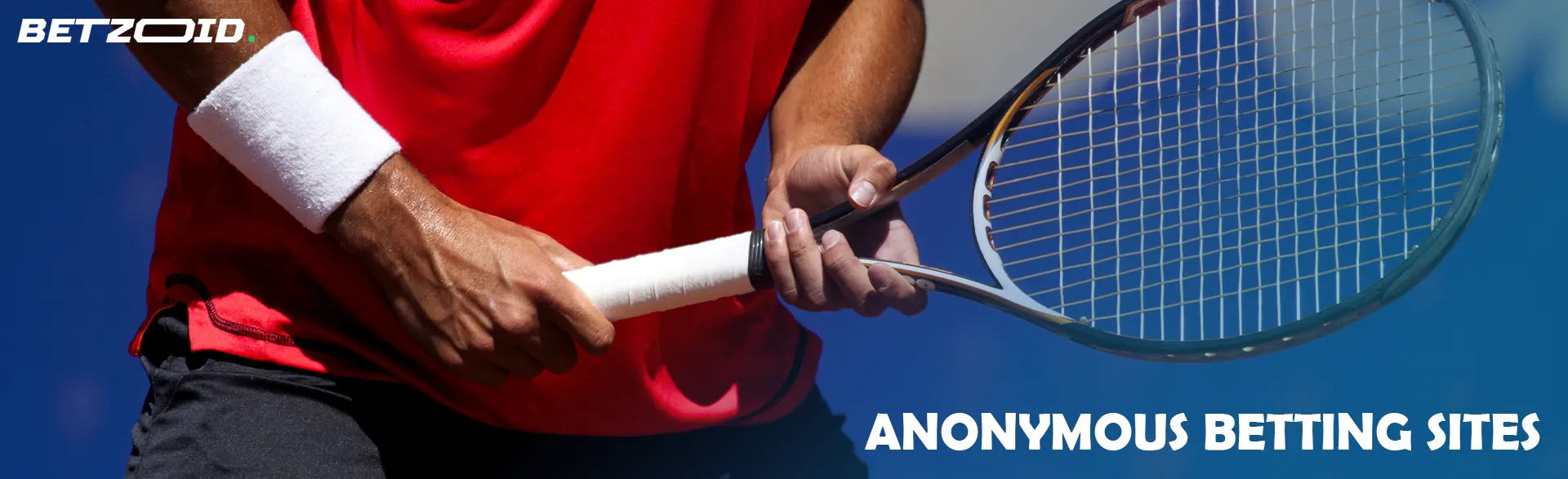 Racket in the hands of a tennis player.