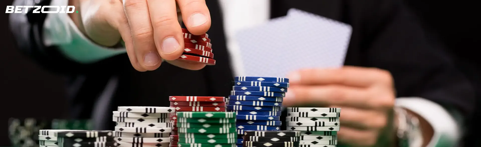 The player places the chips in a stack in front of him.