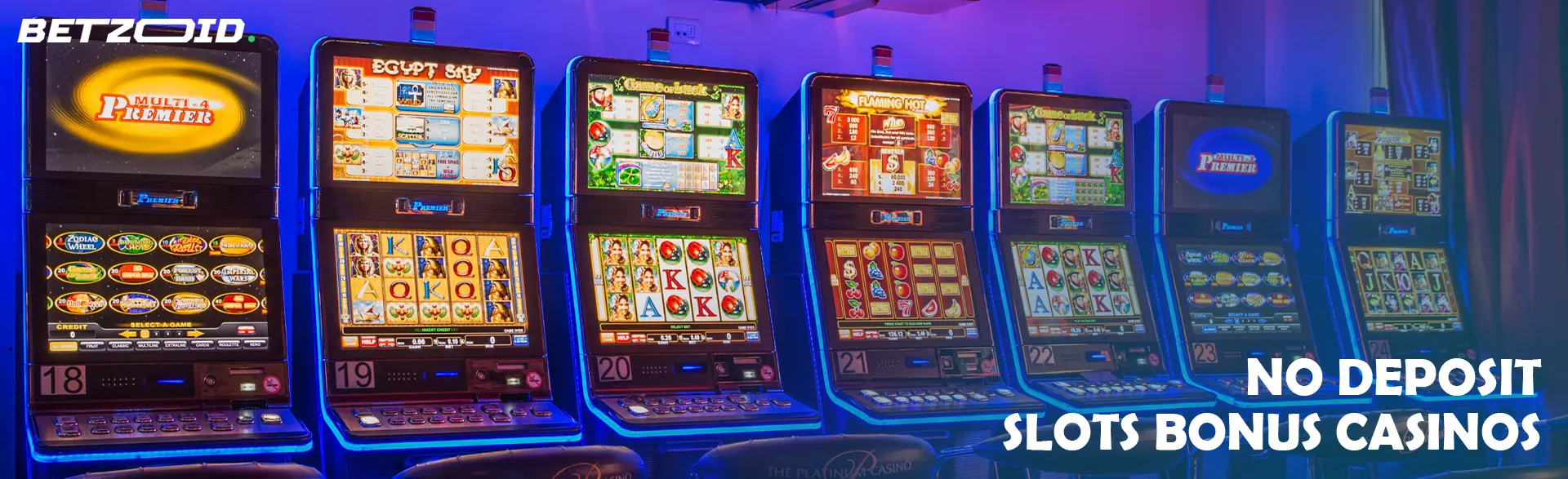 Slot machines stand in a row.