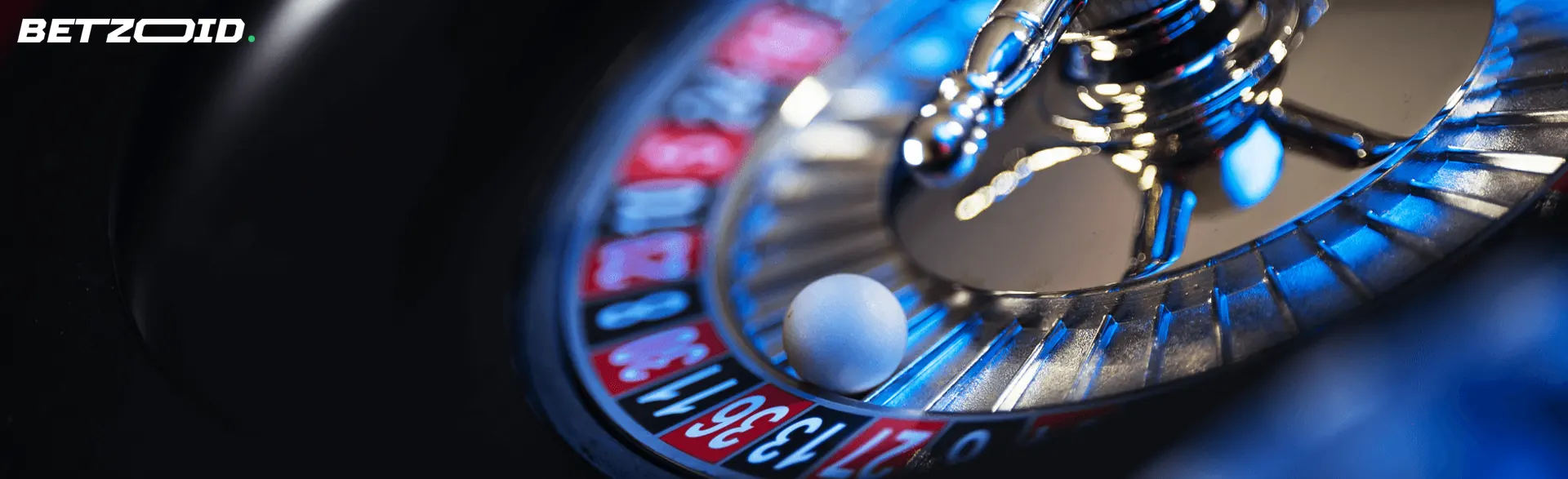 Roulette wheel on a dark background.