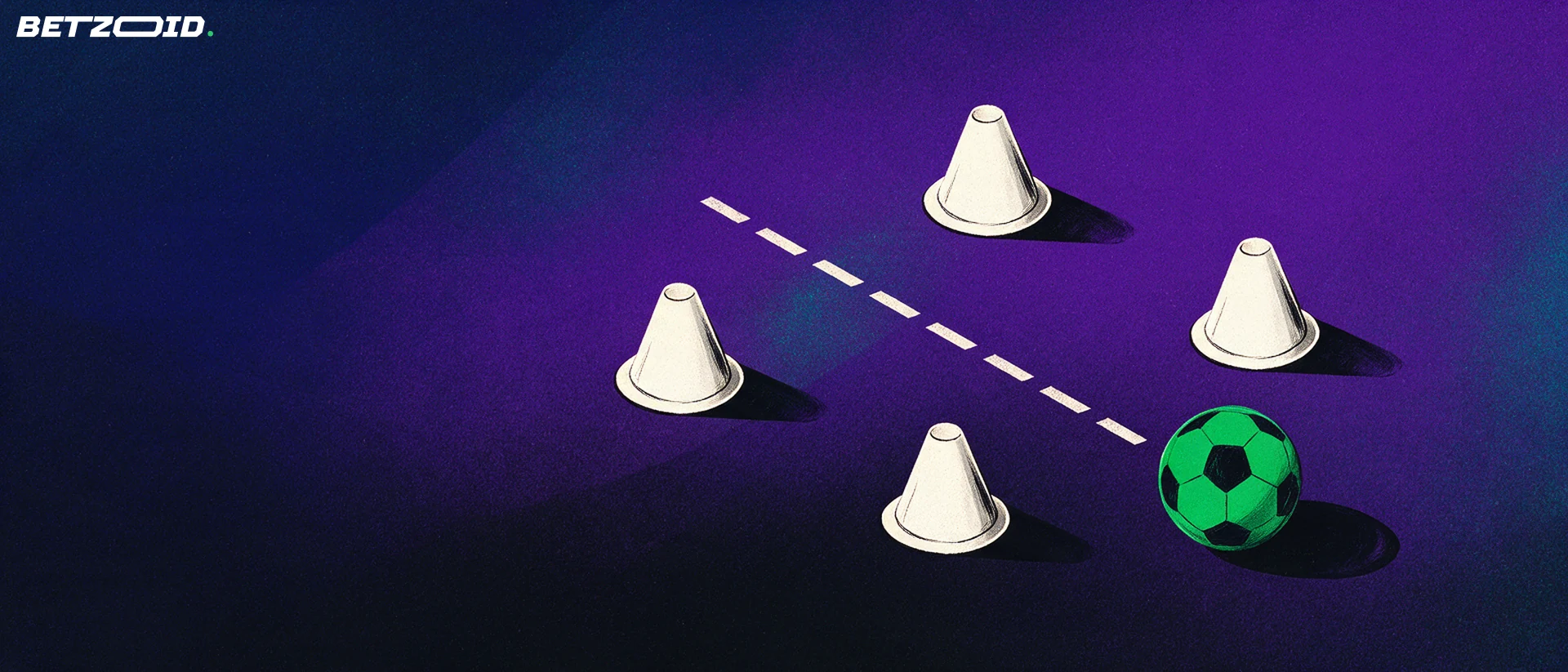 Training cones and a football show passing routes.
