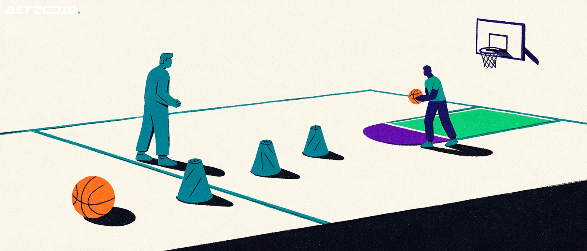 Tréninkové kužely a basketbalový míč na palubovce.